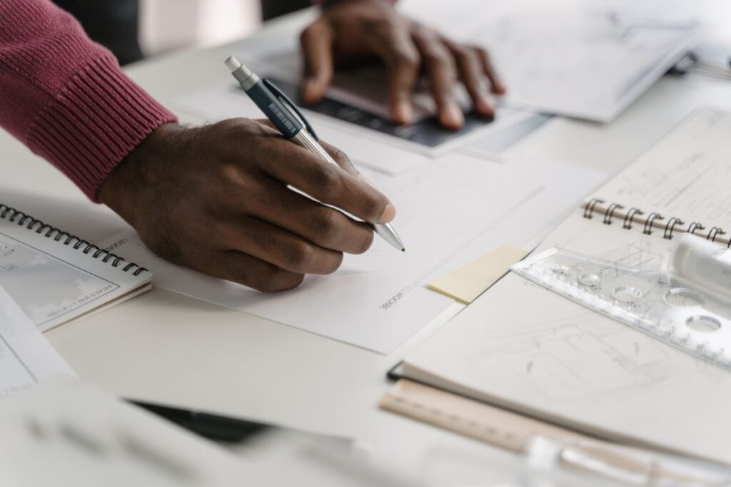 Engineer reviewing drawing sheets produced from a BIM model